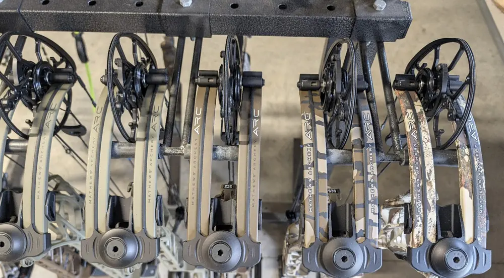 Several Mathews ARC compound bows displayed at Black Flag Archery